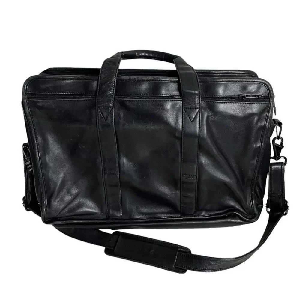 TUMI Black Leather Bag Laptop Multi Pockets Zippers Top Handles Shoulder Strap